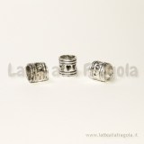 Spaziatore a foro largo in metallo argento antico con cuoricini 7x7mm