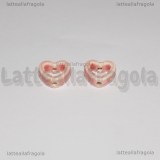 Cuore in Ceramica Rosa foro passante 13.5x12mm