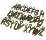 Set Charms Alfabeto in metallo color bronzo 26pezzi