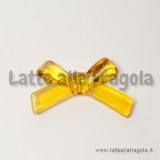 Connettore Fiocco in plastica arancione trasparente foro passante 34x20mm