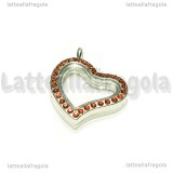 Ciondolo Apribile Cuore in metallo argentato strass rossi 34x29mm