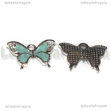 Ciondolo Farfalla con strass in metallo argentato smaltato azzurro 19x15mm