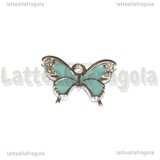 Ciondolo Farfalla con strass in metallo argentato smaltato azzurro 19x15mm