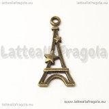 Ciondolo double-face Torre Eiffel e stella in metallo color bronzo 29x13mm