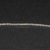 Rondelle mezzocristallo sfaccettato Cristal AB 2x1.5mm filo 37cm