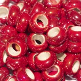 Perla in ceramica rosso effetto perlato 13x6mm